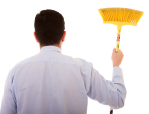 man holding broom